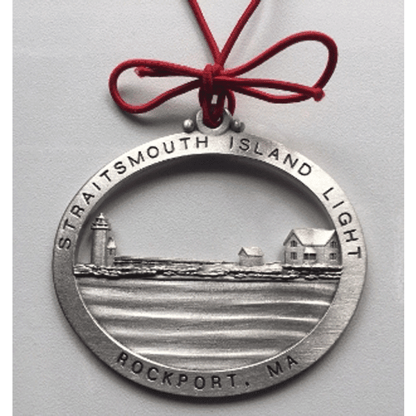 A silver ornament with the name of straitsmouth island light.