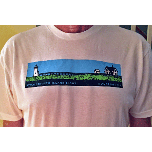 A man wearing a t-shirt with a picture of a lighthouse.