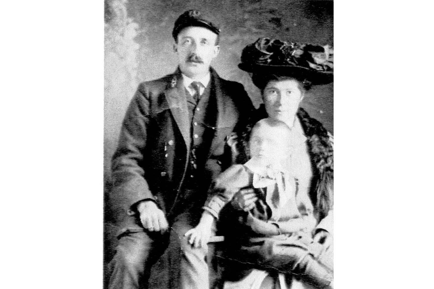 A man and woman sitting next to each other.