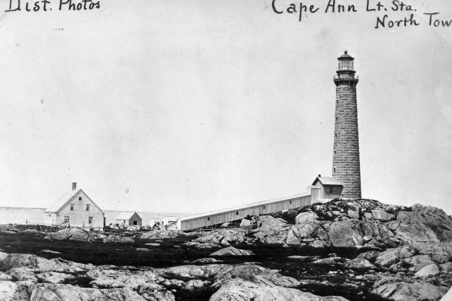 A black and white photo of the cape ann lighthouse.