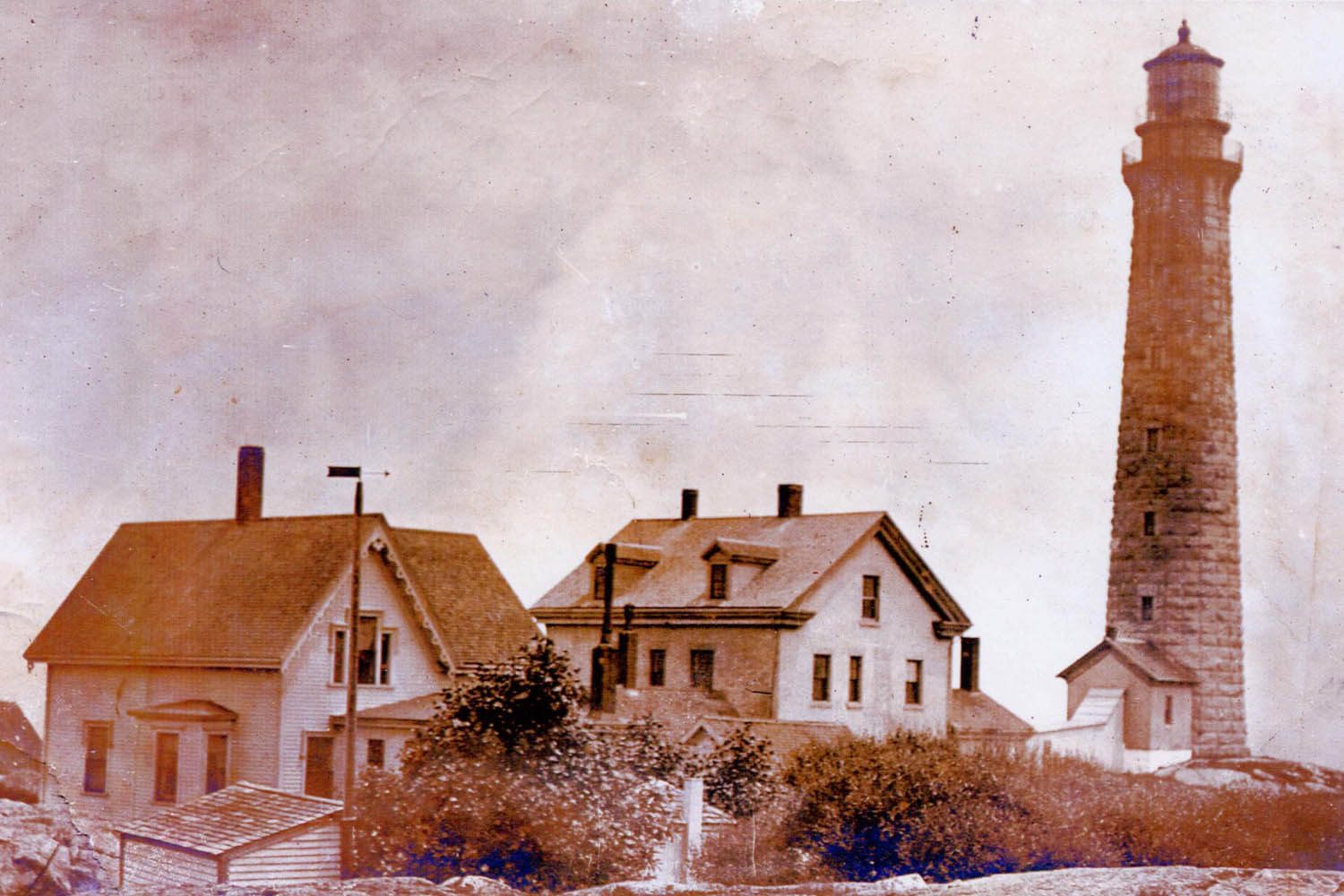 Principal keeper and assistant keeper houses with picket fence and outhouse c.1880.