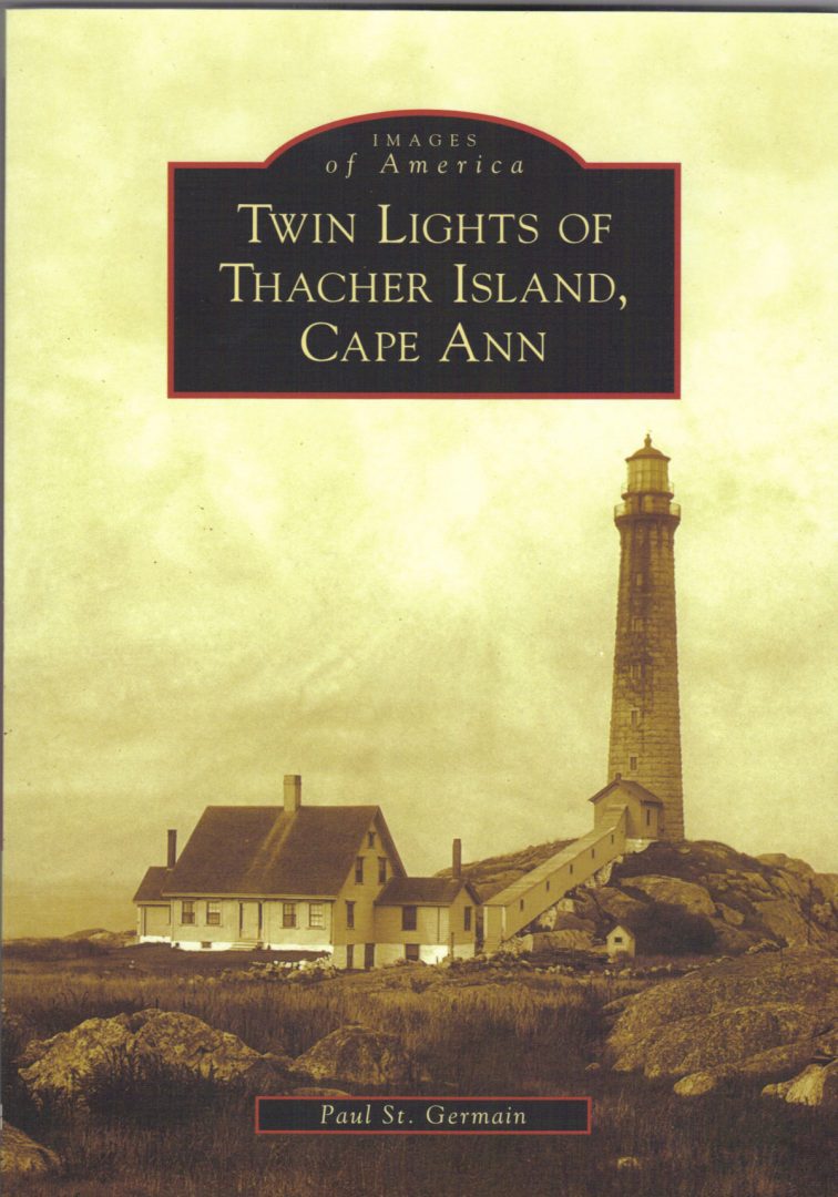 A book cover with a lighthouse and some houses