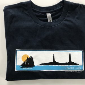 A black t-shirt with a picture of a boat and lighthouse.