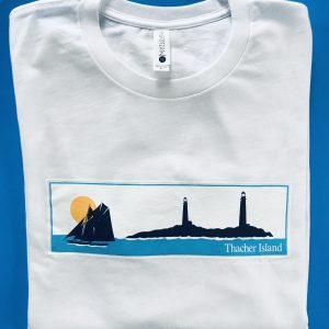 A white t-shirt with a picture of a lighthouse.
